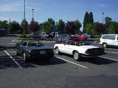 Elaina and a white '90 Spider. "I don't get to drive it in the winter," said its Portland owner. Elaina and a white '90 Spider. "I don't get to drive it in the winter," said its Portland owner.