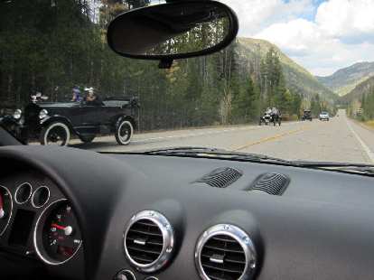 Ford Model Ts going up Highway 14. We saw them earlier near Rustic while they were stopped. Ford Model Ts going up Highway 14. We saw them earlier near Rustic while they were stopped.