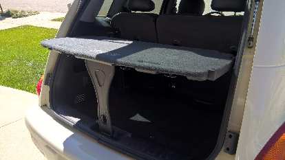 The PT Cruiser's parcel shelf in its tailgating, "table" position.