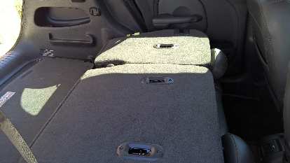 The PT Cruiser's rear seats folded down. The PT Cruiser's rear seats folded down.