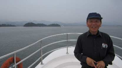 My dad on the cruise ship at Thousand Island Lake.