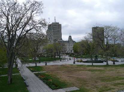 Plaza with trees and tall buildings in Quebec City. Plaza with trees and tall buildings in Quebec City.