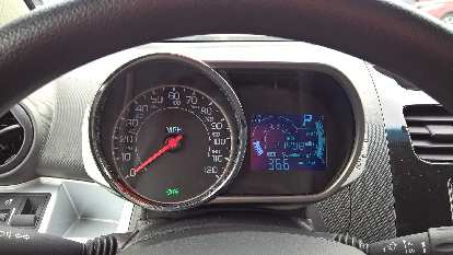 Motorcycle-inspired gauge pod inside a 2015 Chevrolet Spark.
