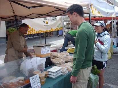 Having sweet mango lassis at the Palo Alto Farmers' Market.