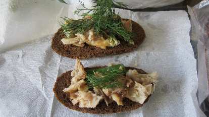 Fried fish with dill on rye bread.  So good.