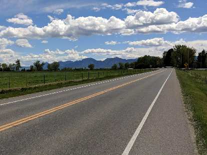 Mile 123: The view of the Flatirons from west of Longmont, Colorado. Mile 123: The view of the Flatirons from west of Longmont, Colorado.