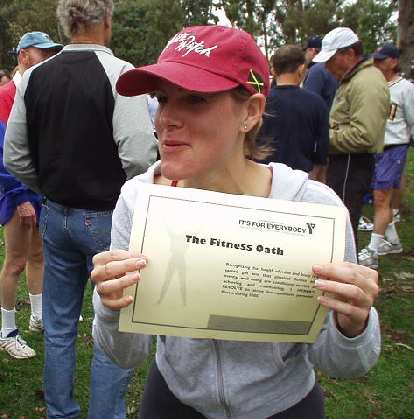 Peggy was a lot more social than I was during the run, even finding out that Stephanie (shown here) was from my childhood town of Stockton.  Here Stephanie is holding up the "Fitness Oath" we had to recite at the beginning of the run.  It was pretty funny since a "judge" made us repeat the oath, but no one could remember the words since his sentences were so long!