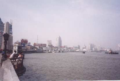 Another view at the Bund, with large corporations and their English logos.