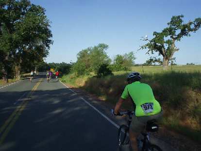 [Mile 18, 7:32 a.m.] Here's AJ cycling along during the first leg of the ride, when our overall average speed was still over 20 mph.  Belying his flat handlebars and 28mm-wide tires on his Marin cross bike, AJ proved to be amazingly strong and fast the entire ride.