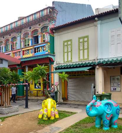 Colorful buildings and elephants in Little India, Singapore.