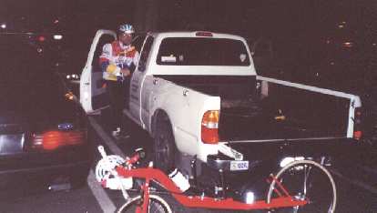 Harry Gretzke and my red Reynolds Wishbone recumbent at the start of the 2000 Solvang Double Century. Harry Gretzke, Felix Wong's red Reynolds Wishbone recumbent, start of 2000 Solvang Double Century