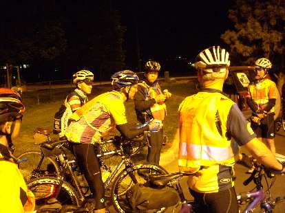[Mile 0, 3:58 a.m.] A couple dozen brevet riders were at the Louisville start, with John Lee Ellis giving final ride tips.