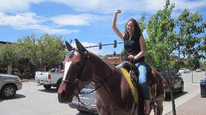 Maureen on a horse, downtown Steamboat Springs, yeehaw