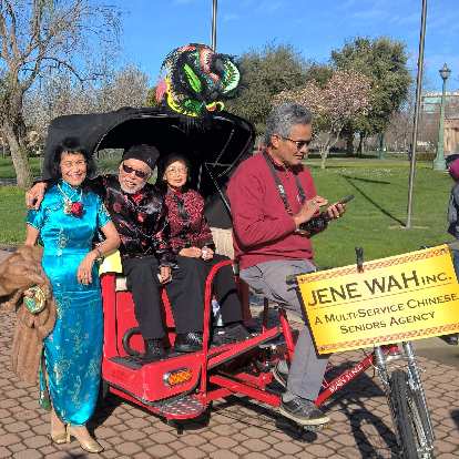 Sylvia Wong with the Jene Wah Seniors Agency cycle in the 2017 Stockton Chinese New Year parade.