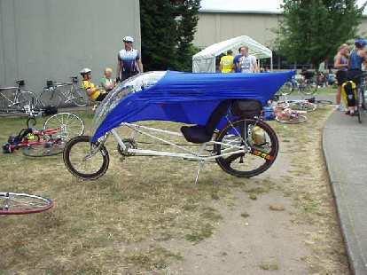 [Day 2, Mile 176, 1:14 p.m.] Another faired recumbent, probably a Gold Rush.