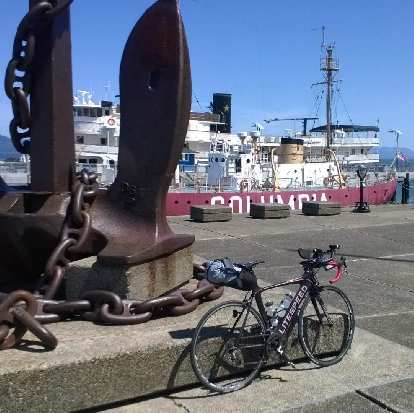 My black 2010 Litespeed Archon C2 in front of a huge anchor in front of the Maritime Museum in Astoria, Oregon. A ship dubbed Columbia is in the background. (05 Jun 2015) black 2010 Litespeed Archon C2, anchor at Maritime Museum, Astoria, Oregon, Columbia ship
