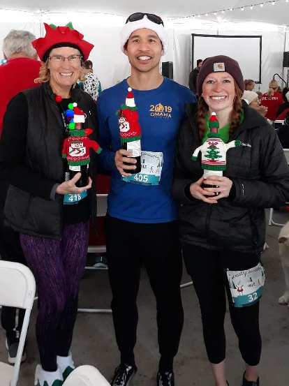 Cathy, Felix and Brooke with their age group awards at the 2019 Sweaty Sweater 4 Mile race.