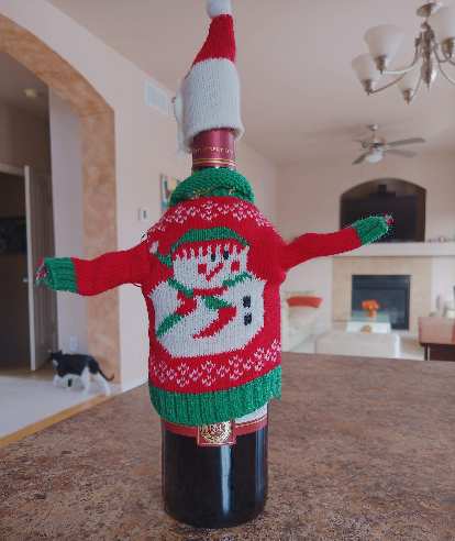 This bottle of Woodbridge red wine wearing a Christmas sweater and hat was my 1st pace age group award at the 2019 Sweaty Sweater 4 Mile race.
