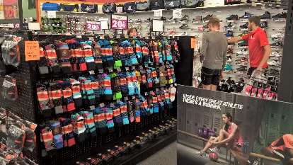 Michael Wacker shopping for shoes and socks at Sports Authority in Fort Collins, Colorado.