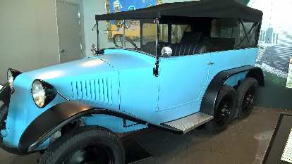 A blue Tatra T26-30 six-wheeler.  Tatra is a company in the Czech Republic that still makes trucks today.