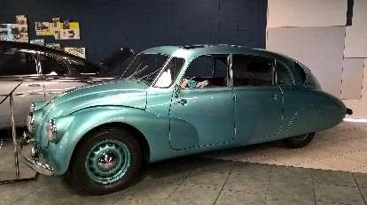 The Tatra T87 was made from 1937-1948 and featured a rear 75-hp V8 and independent suspension.  It had a tendency to oversteer dangerously.