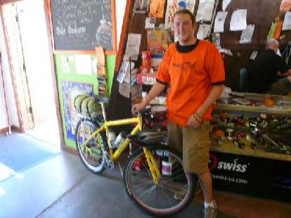 Day 16: At the Orange Peel bike shop, Zach did a great job working on my bike, replacing both tires, rear rim strip, rear tube, brake pads, and cables. He also cleaned the bike and lubed the chain. Day 16: At the Orange Peel bike shop, Zach did a great job working on my bike, replacing both tires, rear rim strip, rear tube, brake pads, and cables. He also cleaned the bike and lubed the chain.
