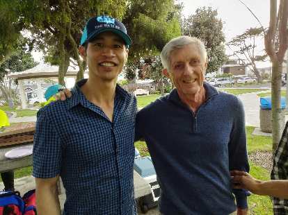 Felix Wong and RAAM legend Pete Penseyres at a party for Team Sea to See and Aira Tech Corp. at Magee Park in Carlsbad, California.