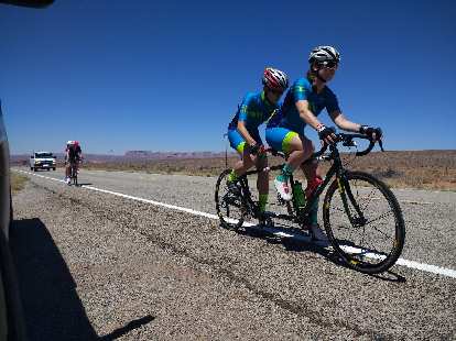 Caroline Gaynor and Jack Chen ready for the relay exchange with Pamela Ferguson and Tina Ament, which occurred when the front wheel of the trailing tandem overlapped the rear wheel of the front tandem. This occurred on Highway 163 west of Bluff, Utah. (18 Jun 2018) Caroline Gaynor and Jack Chen ready for the relay exchange with Pamela Ferguson and Tina Ament, which occurred when the front wheel of the trailing tandem overlapped the rear wheel of the front tandem. This occurred on Highway 163 west of Bluff, Utah.