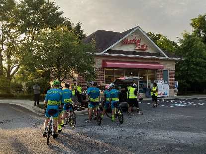 All of Team Sea to See's riders congregating at a market at Ramm's head in Annapolis (Time Station #54) to ride the final few miles in "parade" format to the RAAM finish line.