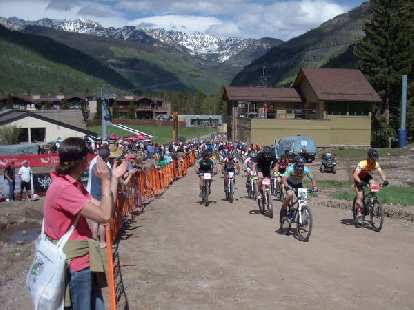 Racers take off in the very hilly X-Country MTB race.