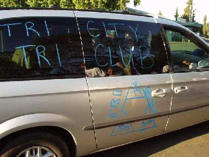 5:05 p.m.: Van #1 pulled in.  But instead of having stuff like "VIRGINIZED" on it, it was nicely adorned with the name of our group, "Tri-City Tri Club".
