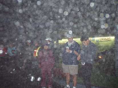 5:17 a.m.: Mile 118: Ok, bad picture--it was a wet, foggy and cold morning in Pacifica.  But I include this picture here because it shows Janette, our great organizer, and Randy, Van #2's awesome driver.