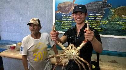 Felix Wong holding a giant crab