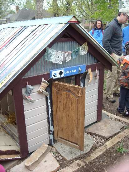The owner of the mobile chicken coop also had a permanent one at his home, using recycled skis for the roof.  This is "Lulu's Lair."