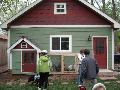 The owner of this house had a friend build a chicken coop that matched the house exactly.