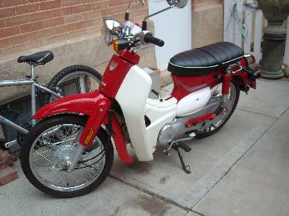 I was talking with Ted (a participant in the tour) about Honda Dreams ("the best selling vehicle of all time"), and by coincidence, at the next chicken coop was this Sym Symba&mdash;a Honda Dream knockoff.