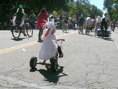 This girl on her tricycle was easily keeping up with everyone. This girl on her tricycle was easily keeping up with everyone.
