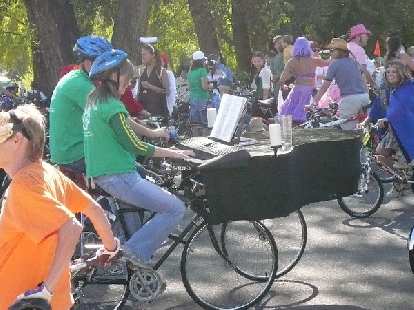 These two people played the piano while they rode.