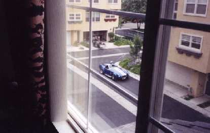 I awoke from bed only to see a beautiful blue AC Cobra replica right outside my house!
