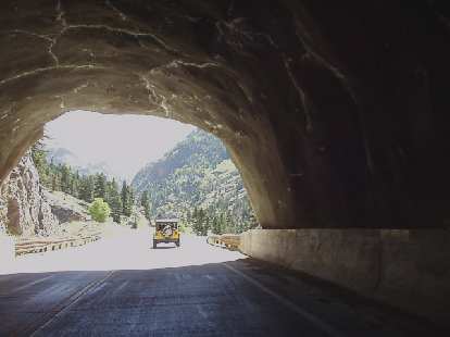 Following an Ouray Jeep Tours vehicle through a tunnel.