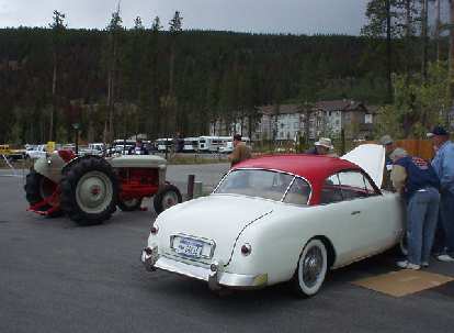 I really loved the white car, which was a Comete Monte-Carlo (a French Ford).  To the left of it is a Ford tractor.