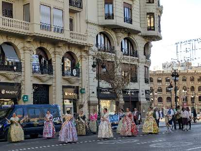 Photo: Women in elaborate dresses during Las Fallas.