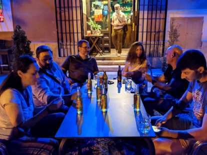 Nieves, Victor, Angel, Lydia, Gerald, and Ismael enjoying late night drinks.