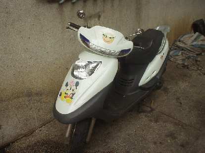 The owner of this scooter must have been a Disney fan! The owner of this scooter must have been a Disney fan!
