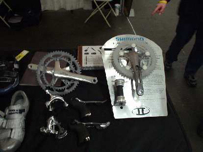 At VeloSwap--the nation's largest annual bicycle swap meet and show--at the Cow Palace in SF was Shimano. Apparently, Ultegra this year has went the way of Dura Ace for the crankset, which to me, still looks aesthetically-questionable and rather Darth-Vader-like. "It's like a woman without a belly button!" I recalled someone posting on a Usenet newsgroup. At VeloSwap--the nation's largest annual bicycle swap meet and show--at the Cow Palace in SF was Shimano. Apparently, Ultegra this year has went the way of Dura Ace for the crankset, which to me, still looks aesthetically-questionable and rather Darth-Vader-like. "It's like a woman without a belly button!" I recalled someone posting on a Usenet newsgroup.