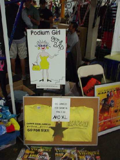 Photo: This booth sold posters, including "Podium Girl Gone Bad" and "Carpe Diem, Lance Armstrong.  Go for six!" (He already did.)