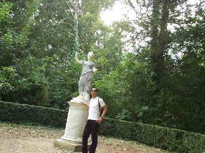 Felix Wong with one of the many statues in the gardens. Felix Wong with one of the many statues in the gardens.