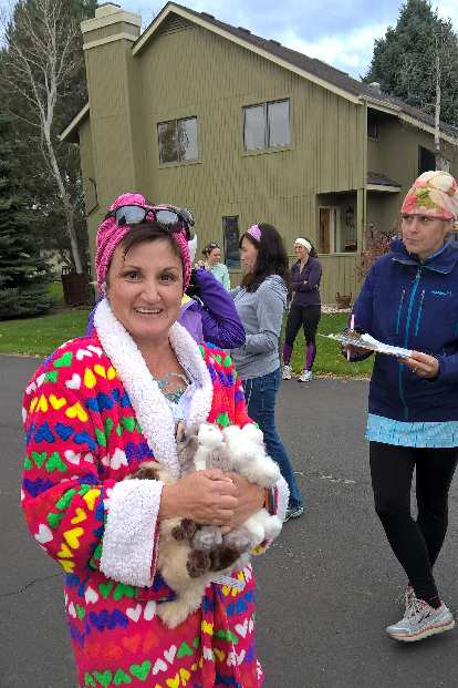 Runner in crazy cat woman costume.