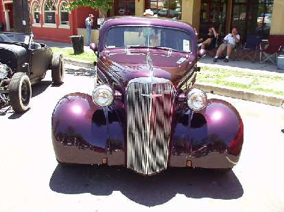Front ends of early era hot rods like this were the inspiration for the modern day Chrysler PT Cruiser.