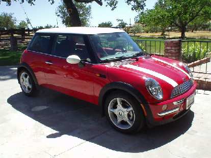 The red Mini Cooper itself with white racing stripes.  Thanks to Sharon's family for the great weekend!
